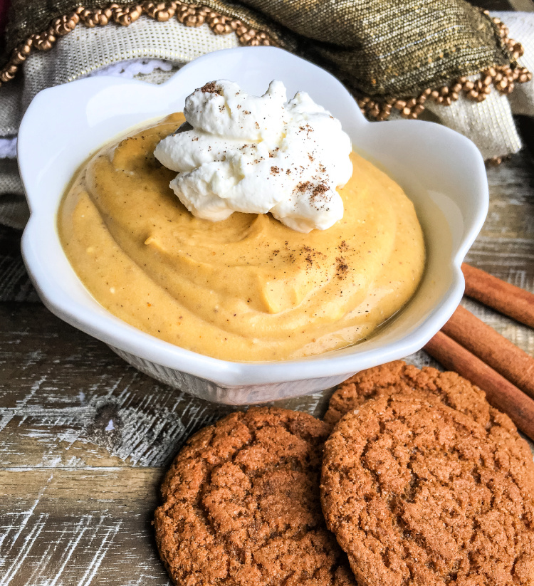 creamy-no-bake-pumpkin-pudding-with-maple-whipped-cream in dish with cookies