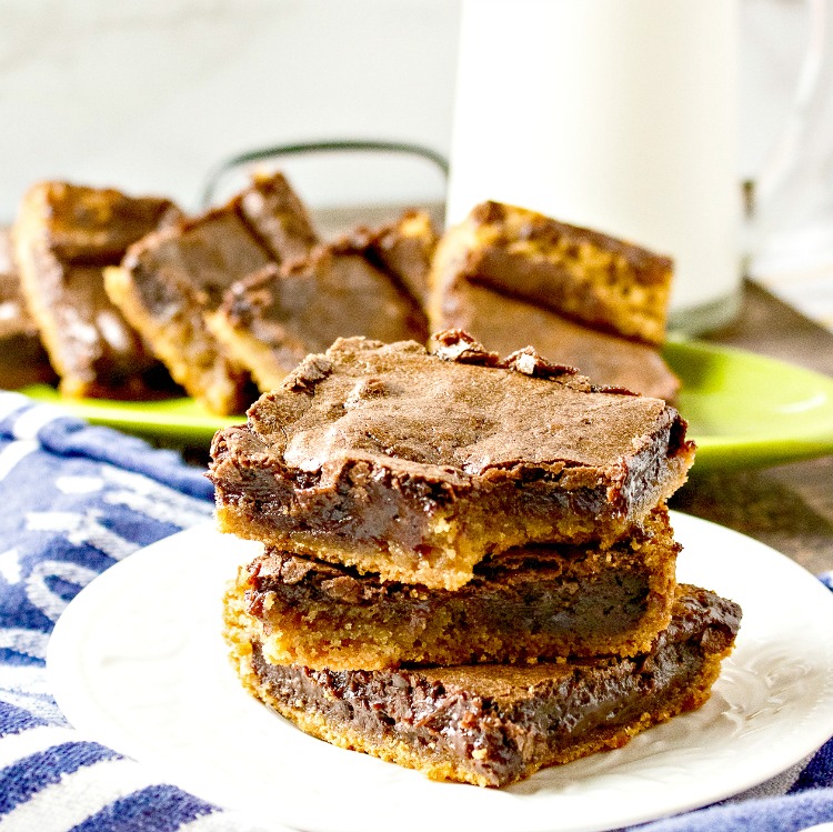 Fudgy Chocolate Peanut Butter Brownie You'll Love my home and travels stacked and ready to eat