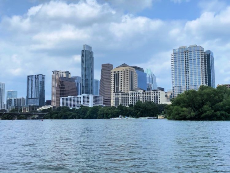 favorite-things-in-austin-my-home-and-travels-lady-bird-lake-capital-cruises-boat skyline of austin