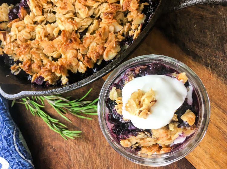 Simple Blueberry Crisp with Maple Syrup my home and travels image blueberry mixture poured into skillet served with topping 