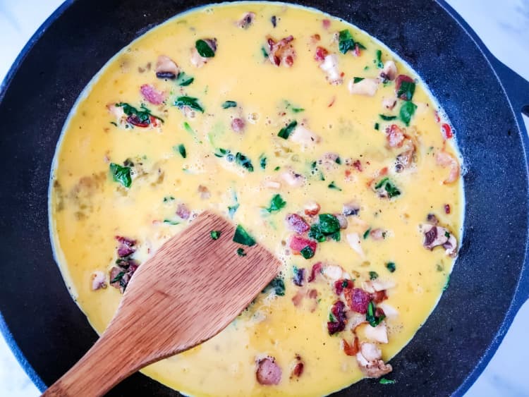 Spinach-Bacon-Mushroom-Frittata-Iron-Skillet-my-home-and-travel stir mixture
