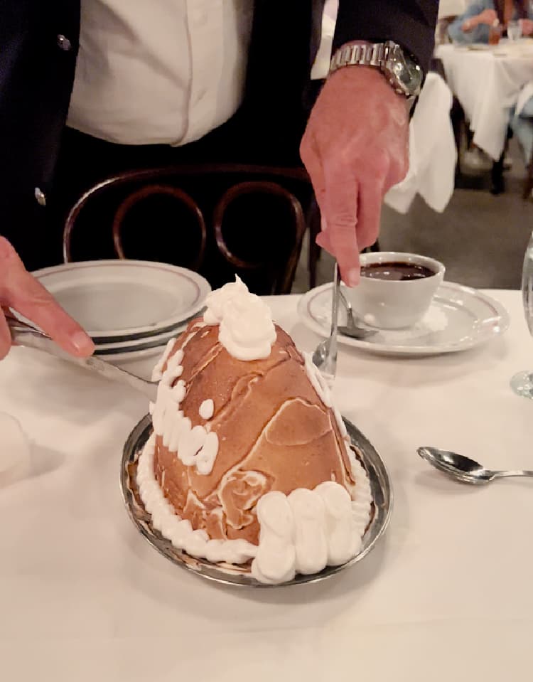 dining-at-antoines-new-orleans-my-home-and-travels-baked alaska cur to serve