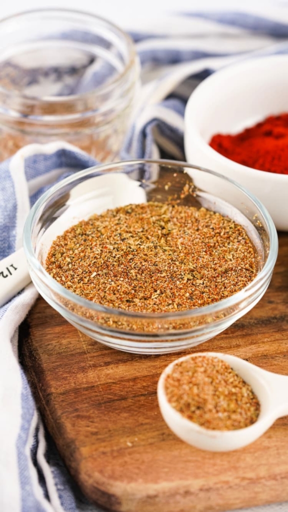 easy homemade taco seasoning recipe my home and travels in bowl with spoon