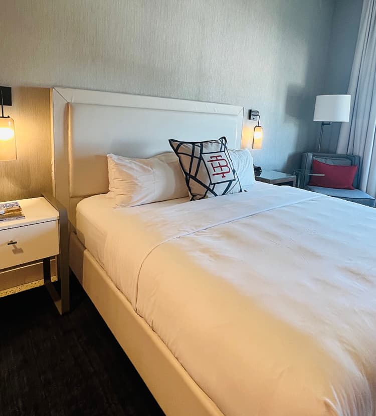 the-bristol-hotel-virginia-my-home-and-travels bedroom with logo pillow