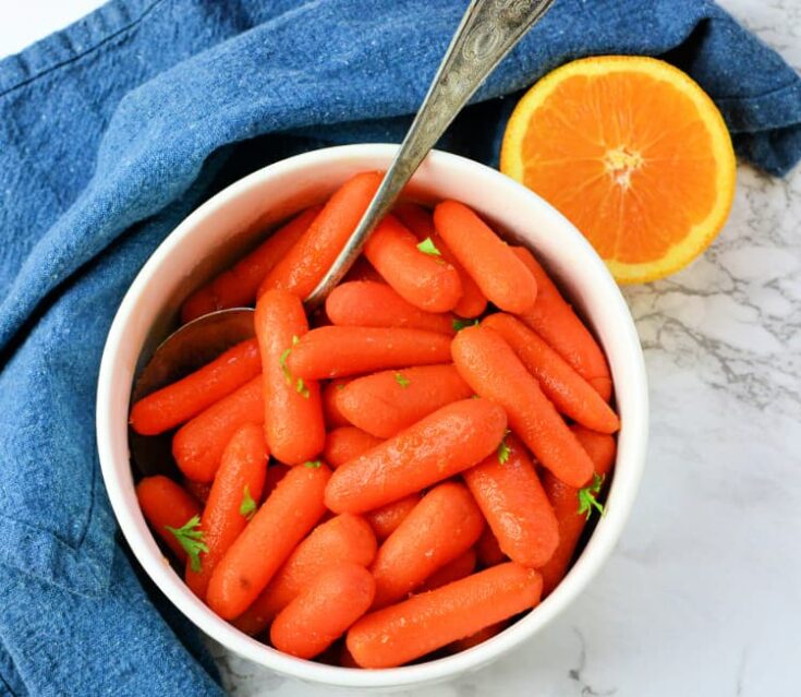 orange glazed carrots in serving bowl my home and travels