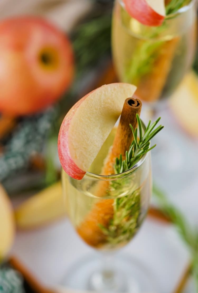 apple-cider-mimosas-my-home-and-travels-single glass with garnish